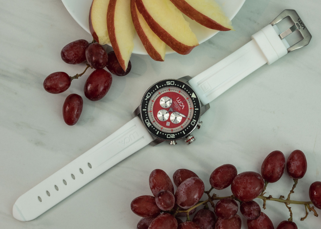 Rosso chronograph with white band tabletop image.